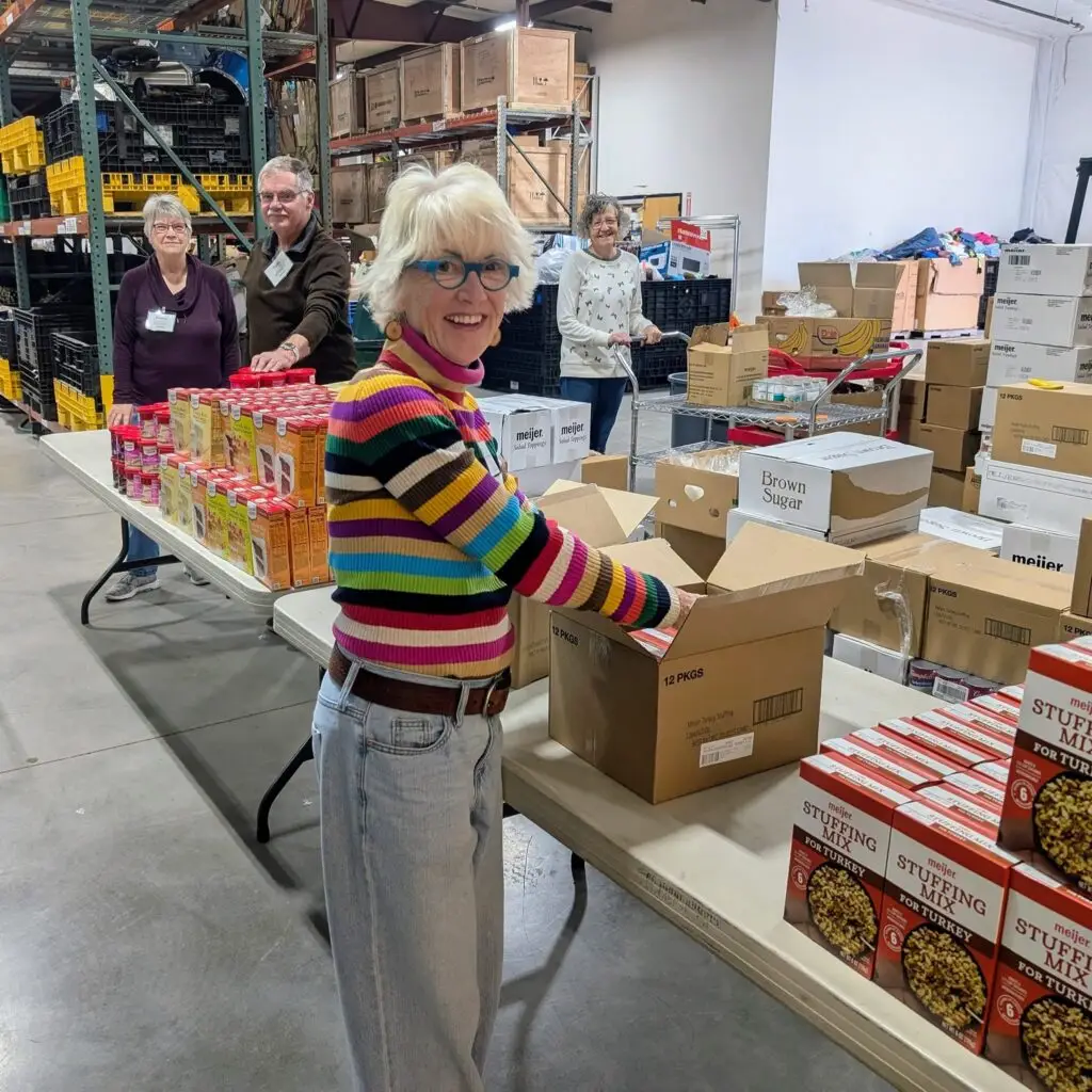 woman packing thanksgiving boxes