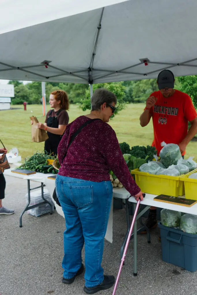 woman shopping at farm stand